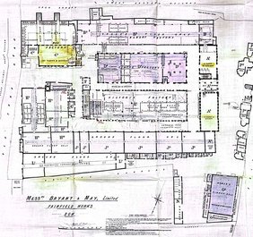 A schematic of a factory with certain areas coloured in by hand.